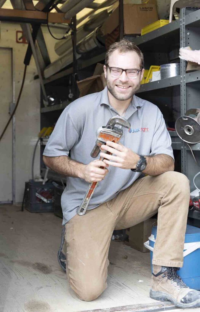 Just Right HVAC tech with tools