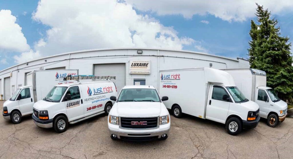 Fleet of HVAC Just Right Heating & Cooling vehicles in Waterford Township