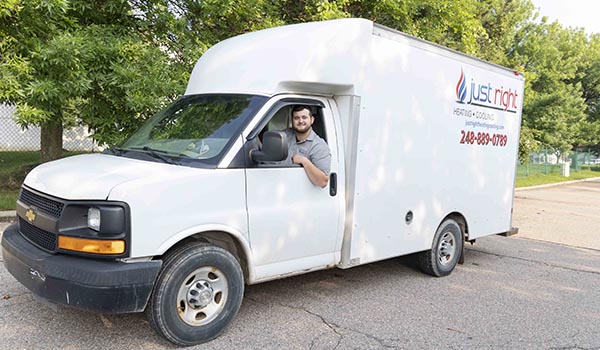 Furnace installer Tony in Just Right Heating & Cooling Van in Waterford Township